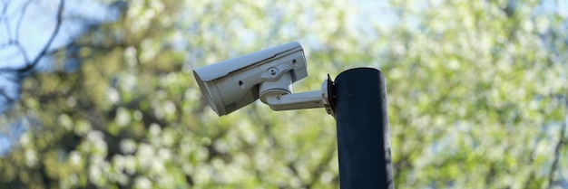 Closeup of mini cctv cameras installed on pillar outside street surveillance camera safety