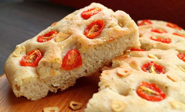 Closeup of Mouthwatering Homemade Tomato and Garlic Italian Focaccia Bread