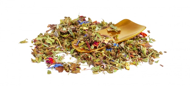 Closeup of natural herbal tea made of various loose dried herbs isolated