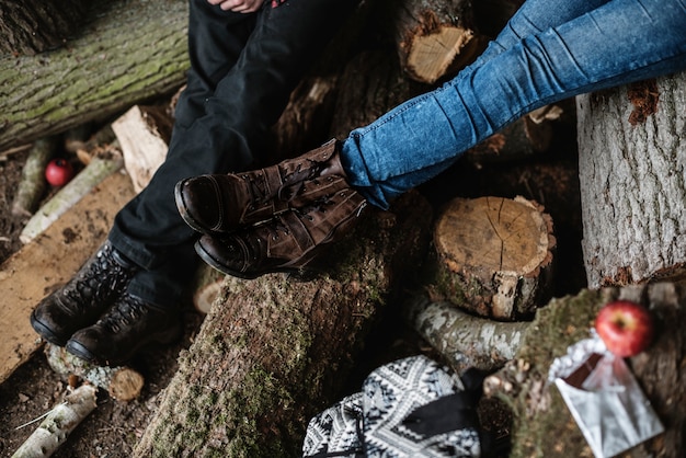 Closeup pair of legs with timbers background