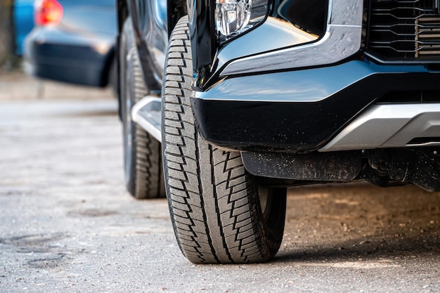 Closeup of parked car on a city street side