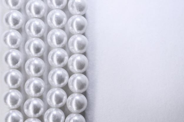 Closeup of pearls garland on a white background