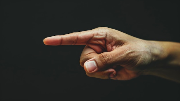 A closeup photo of a hand with fingers crossed