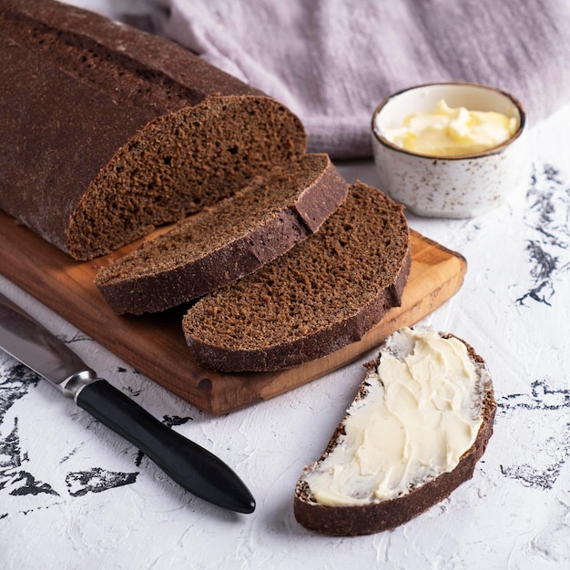 Closeup photo of sliced bread with butter