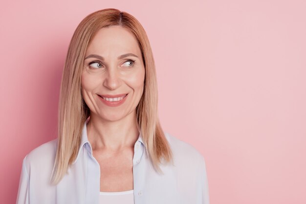 Closeup photo of young attractive pretty shiny woman lady look empty space dream isolated pastel color background