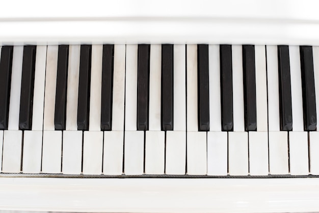 Closeup of piano keyboard Close frontal view