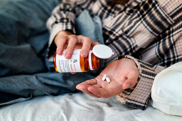 Closeup of pills on palm