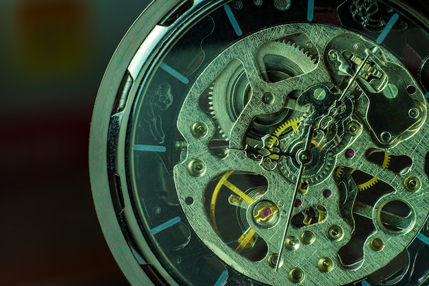 Closeup pocket watch on table and sunlight. At 8 am. o'clock in the morning. Concept of starting work today.