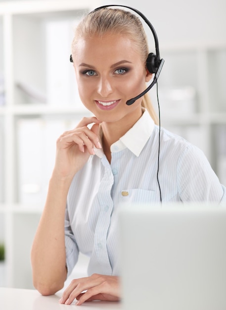 Closeup portrait of a customer service agent sitting at office