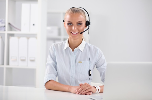 Closeup portrait of a customer service agent sitting at office