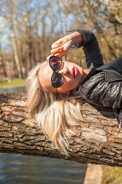 Closeup Portrait of Cute Woman Relaxing in Outdoors