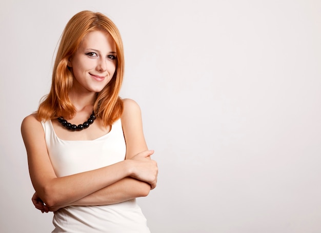 Closeup portrait of cute young redhead business woman