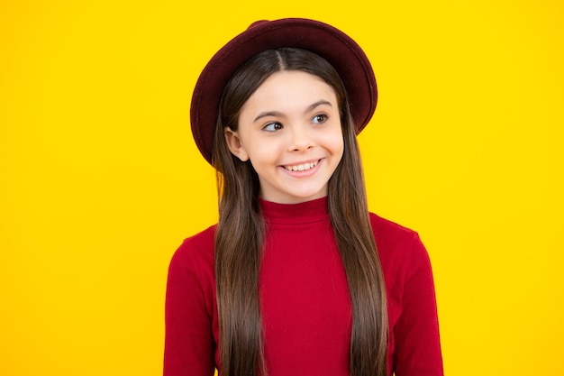 Closeup portrait of girl teen face Portrait of a cute teen child Studio shot isolated background Happy teenager portrait Smiling girl