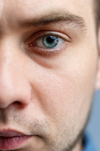 Closeup portrait of a man in a white polo