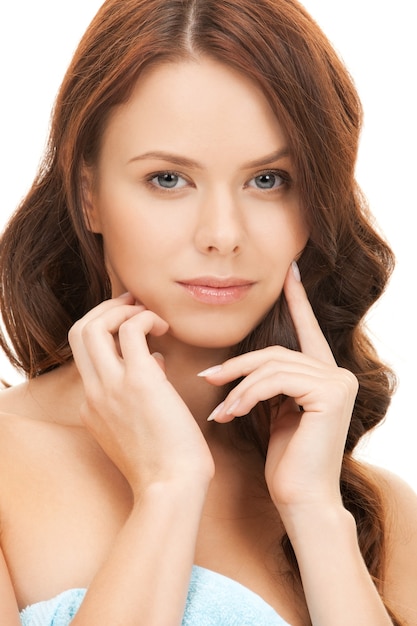 closeup portrait picture of beautiful woman in towel