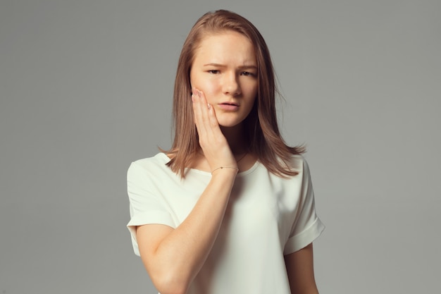 Closeup portrait, sad young woman