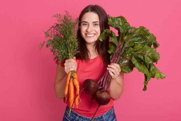 Closeup portrait of smiling female after harvesting