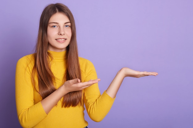 Closeup portrait of smiling female with long straight hair