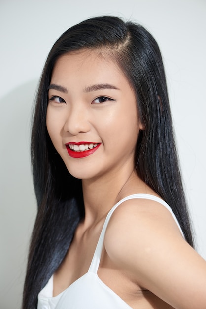 Closeup portrait of a young attractive Asian woman