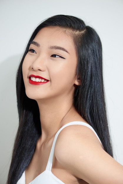 Closeup portrait of a young attractive Asian woman