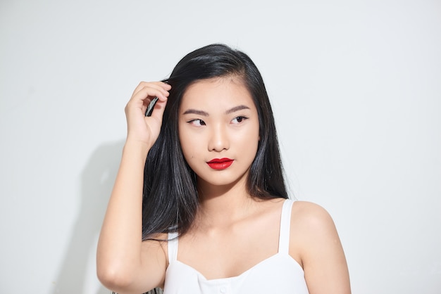 Closeup portrait of a young attractive Asian woman