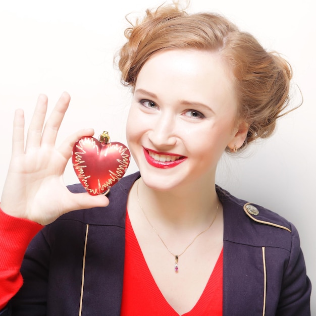 Closeup portrait of young beautiful woman with attractive tooth