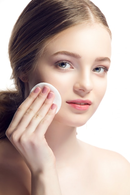 Closeup portrait of young beautiful woman with perfect skin