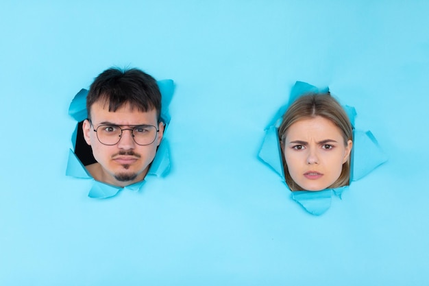 Closeup portrait of young excited woman and man shocked and amazed by commercial offer