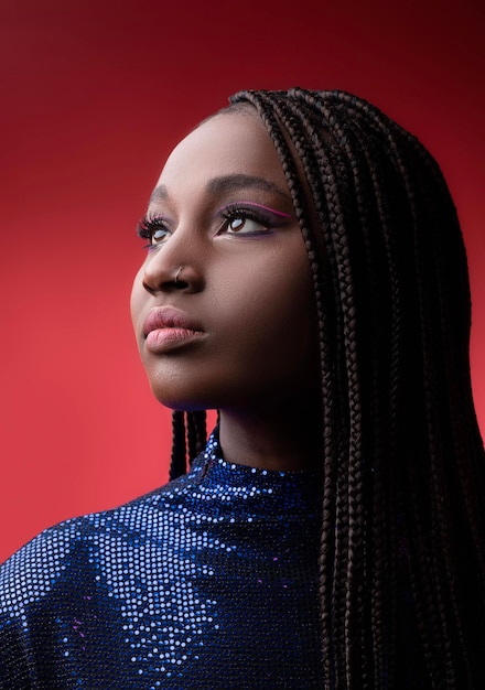 Closeup portrait of young gorgeous black woman in sequined dress