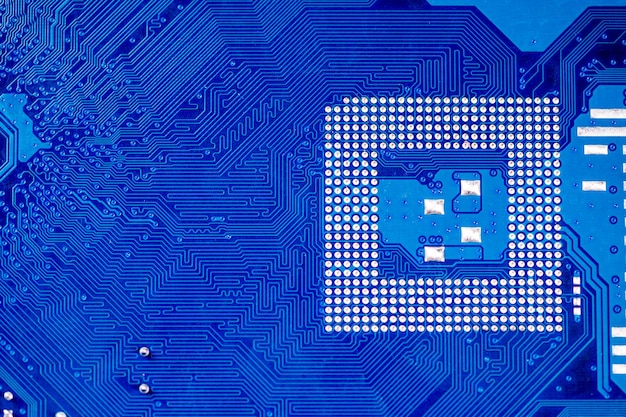 Closeup of a printed blue computer circuit board