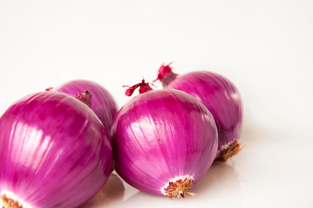 Closeup purple onion white background vegetables