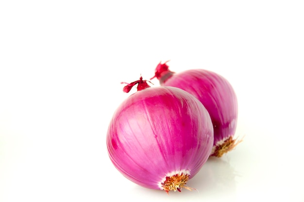 Closeup purple onion white background vegetables