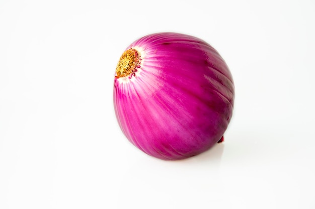 Closeup purple onion white background vegetables