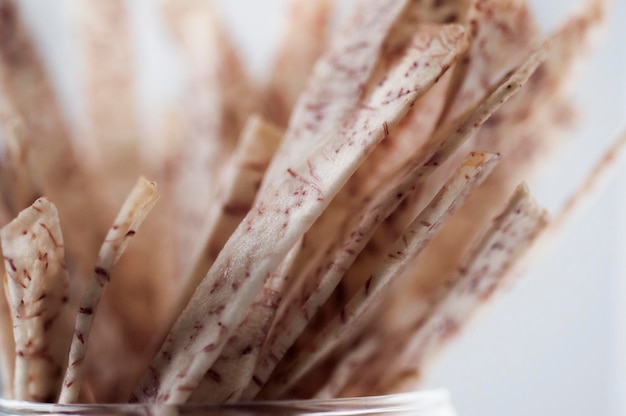 Closeup purple and white taro strips white background taro