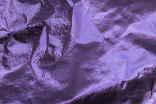 Closeup of purple  wrinkled paper texture background