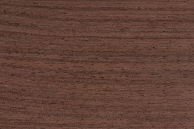 Photo closeup of rich wenge wood texture dark brown plank ideal for furniture and flooring