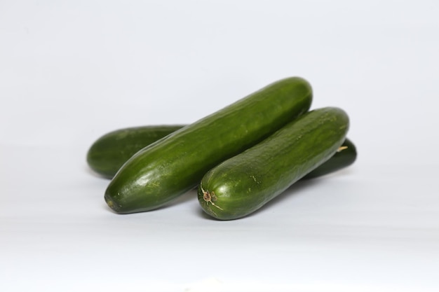 Closeup of ripe fresh cucumbers isolated on a white background