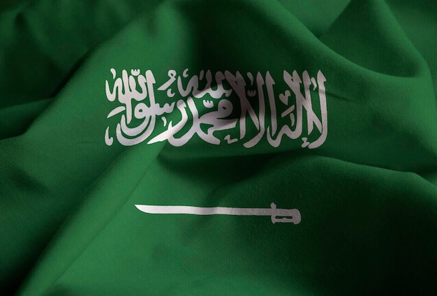 Photo closeup of ruffled saudi arabia flag saudi arabia flag blowing in wind