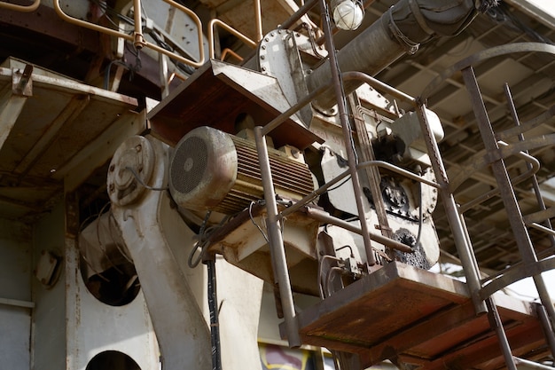 Closeup of rusty excavator bucket on summer day