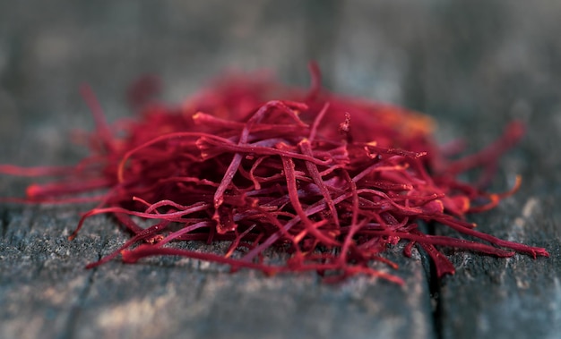 Closeup of Saffron on wooden surface