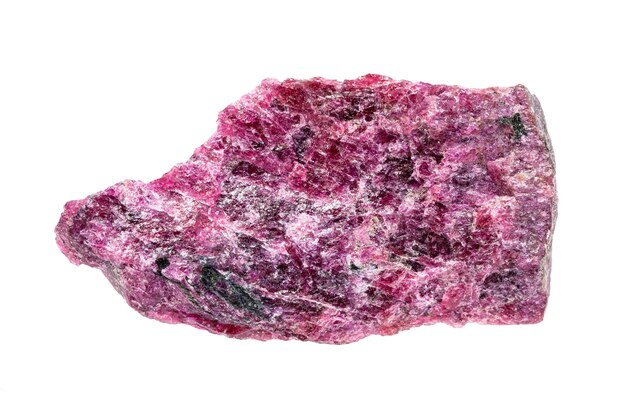 Closeup of sample of natural mineral from geological collection unpolished eudialyte rock isolated on white background