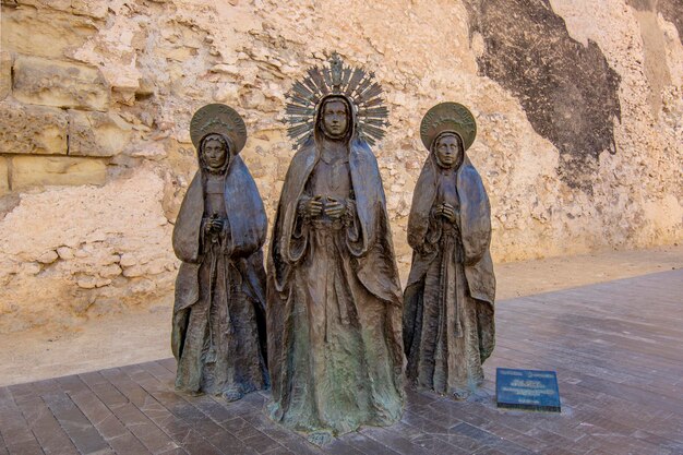 Closeup of sculpture Las tres Marias in Elche Alicante