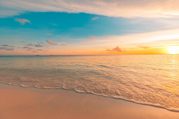 Closeup sea sand beach Sunset beach landscape Orange golden sun rays sand seascape tropical coast