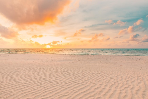 Closeup sea sand beach Sunset beach landscape Orange golden sun rays sand seascape tropical coast