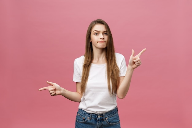 Closeup of serious strict young woman wears white shirt