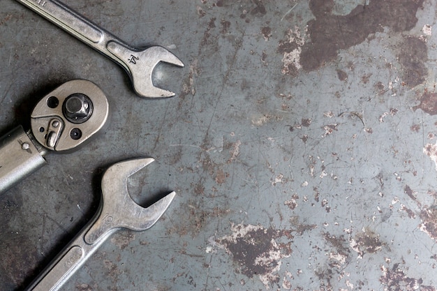 Closeup set of tools for motorbike repair the desk. top view