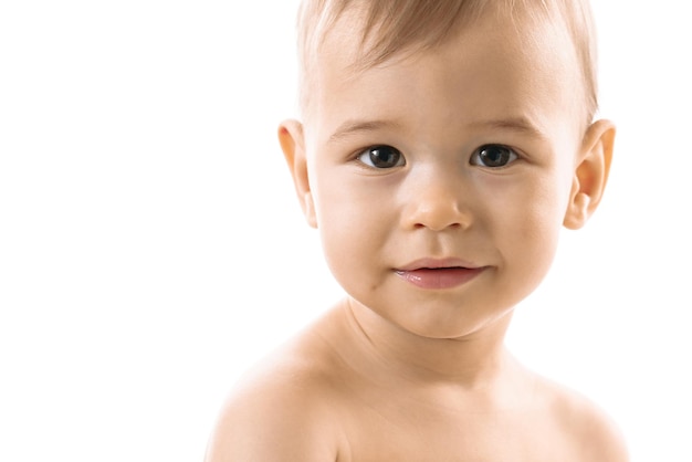 Closeup shot of curious little boy face