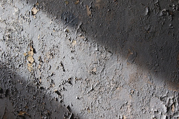 Closeup shot of dirty shabby wall in abandoned building