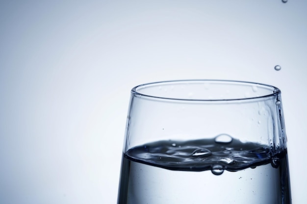 Closeup shot of pouring water into a glass