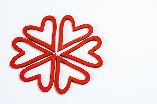 CloseUp Shot of Red Hearts on a White Surface